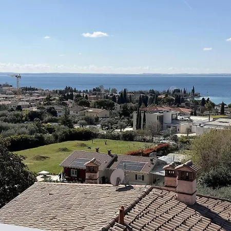 Ll Sogno - Attico Con Terrazza Panoramica شقة باردولينو